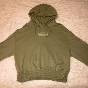 cropped green sweatshirt